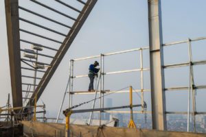 worker on scaffold