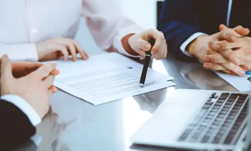 wrongful death attorney consulting with clients